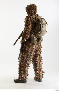 Frtankie Perry Standing with Gun in Ghillie holding gun standing…